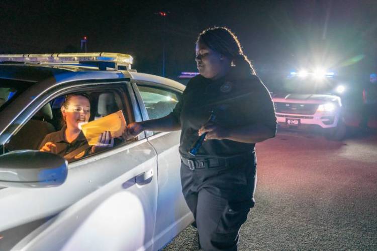 Officer giving a ticket