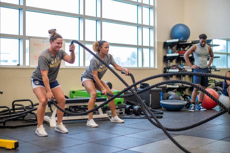 Girls lifting ropes